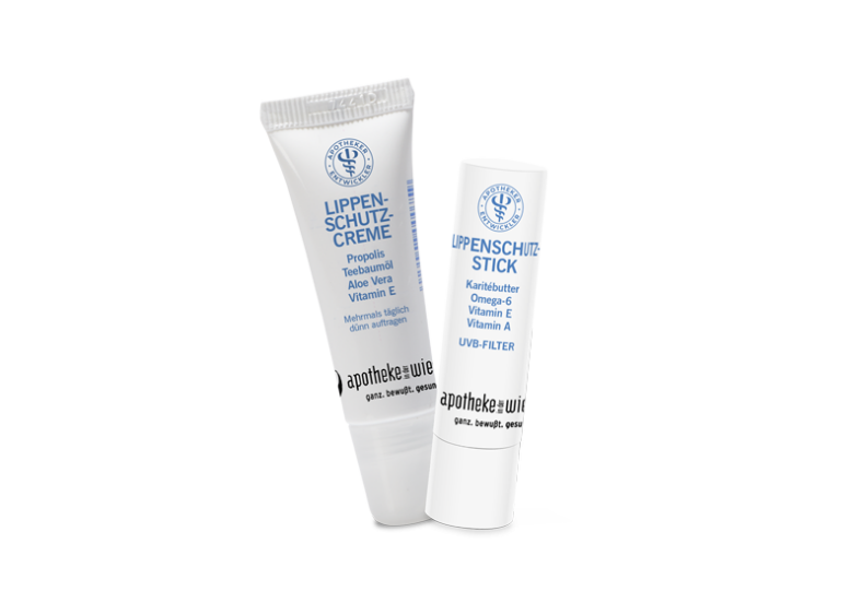 Lippenschutz-Creme und Lippenschutz-Stick in weißen Verpackungen, beide mit pflegenden Inhaltsstoffen.