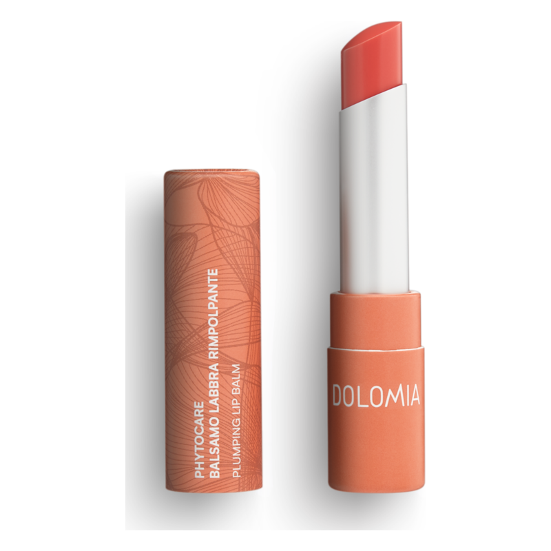 Ein Lippenbalsam in einem orangefarbenen Verpackungsrohr mit einer schmalen, abgerundeten Kappe.
