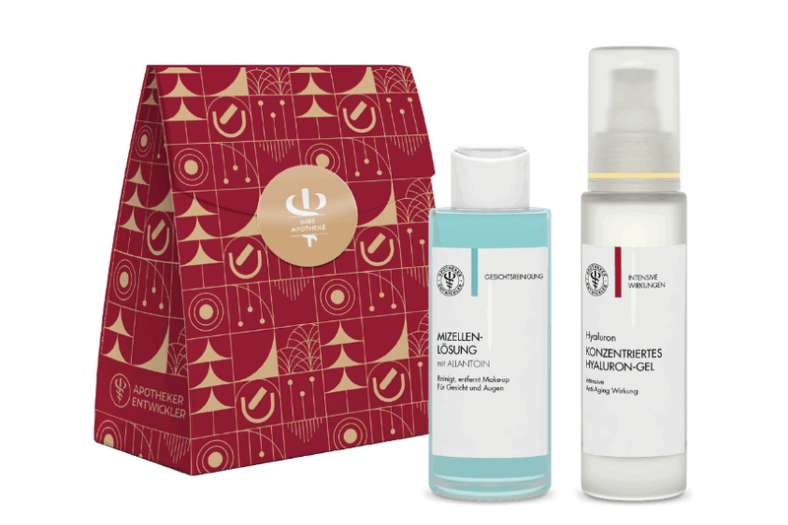 Kosmetikset in einer rot-goldenen Verpackung mit Mizellen-Lösung und Hyaluron-Gel.
